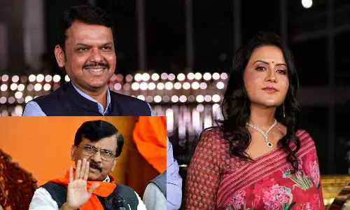 கணவரின் டாவோஸ் பயணத்தை பிக்னிக் என்பதா?- சஞ்சய் ராவத்துக்கு பட்நாவிஸ் மனைவி பதிலடி