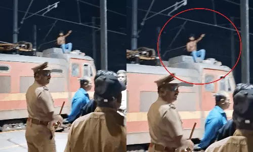 #Railway | ரெயில் என்ஜின் மீது அமர்ந்து அடம் பிடித்த வாலிபர்